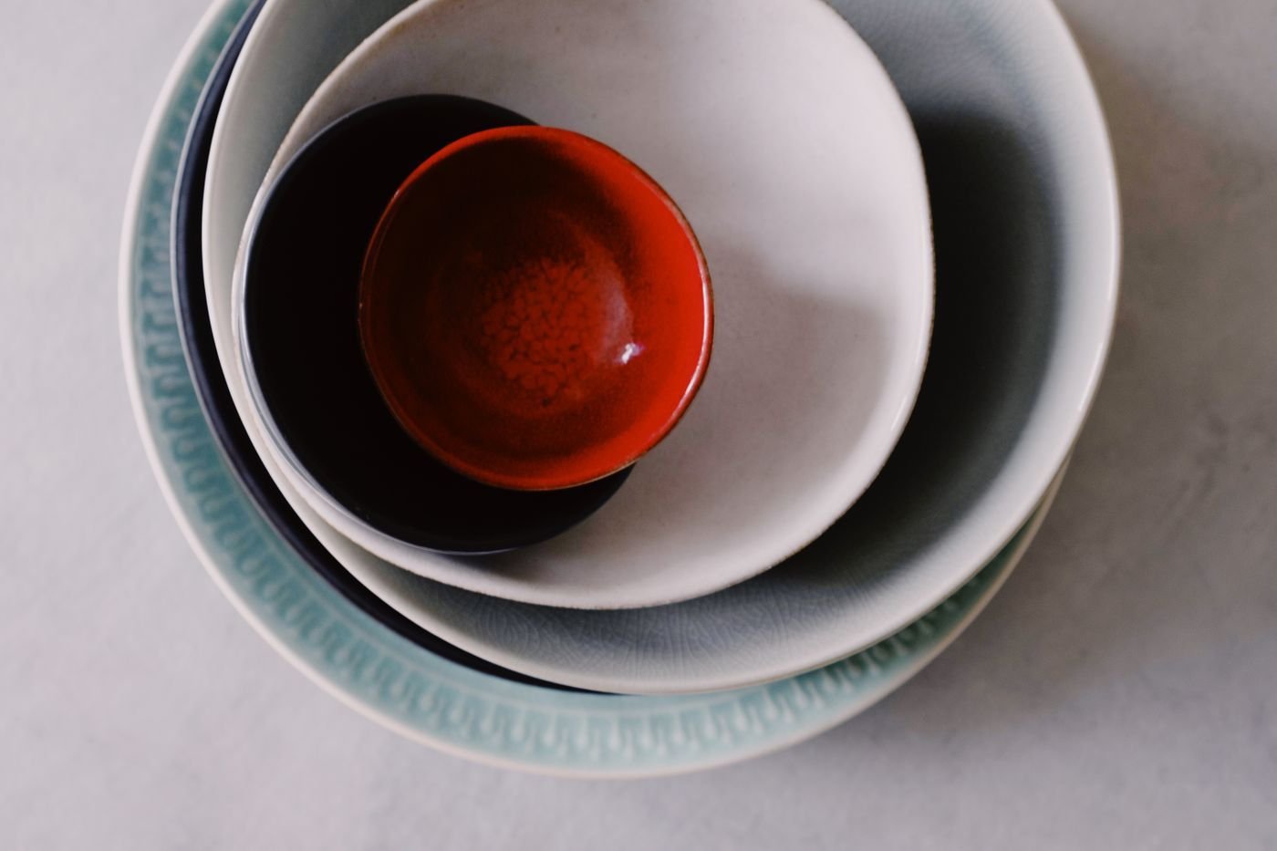 Nesting Stoneware Bowls in Grey, Sage and Clay Red