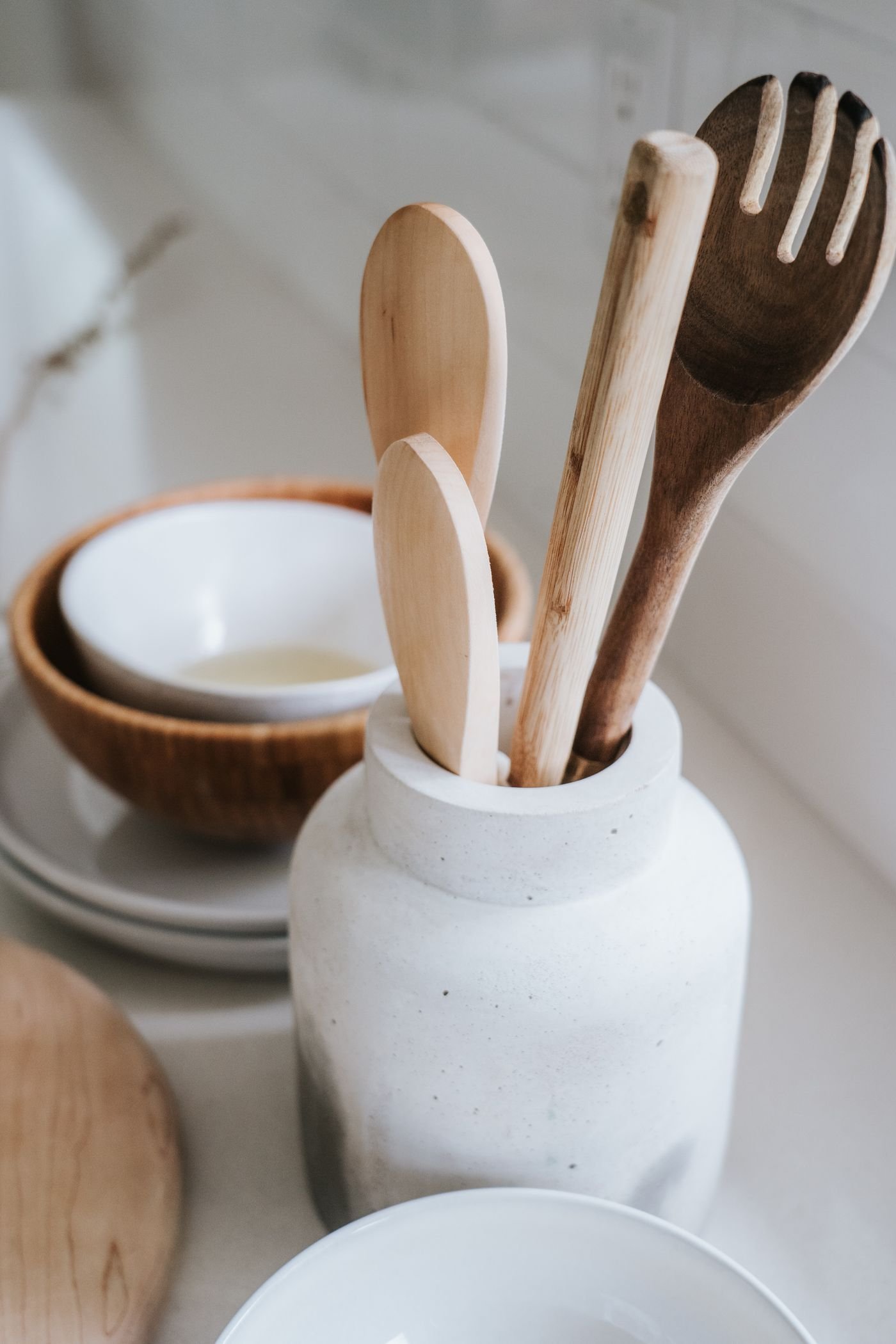 White Stoneware Crock with Wooden Utensils
