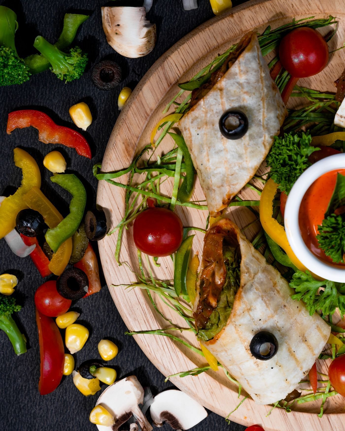 Mediterranean Wrap Board with Olives and Mushrooms